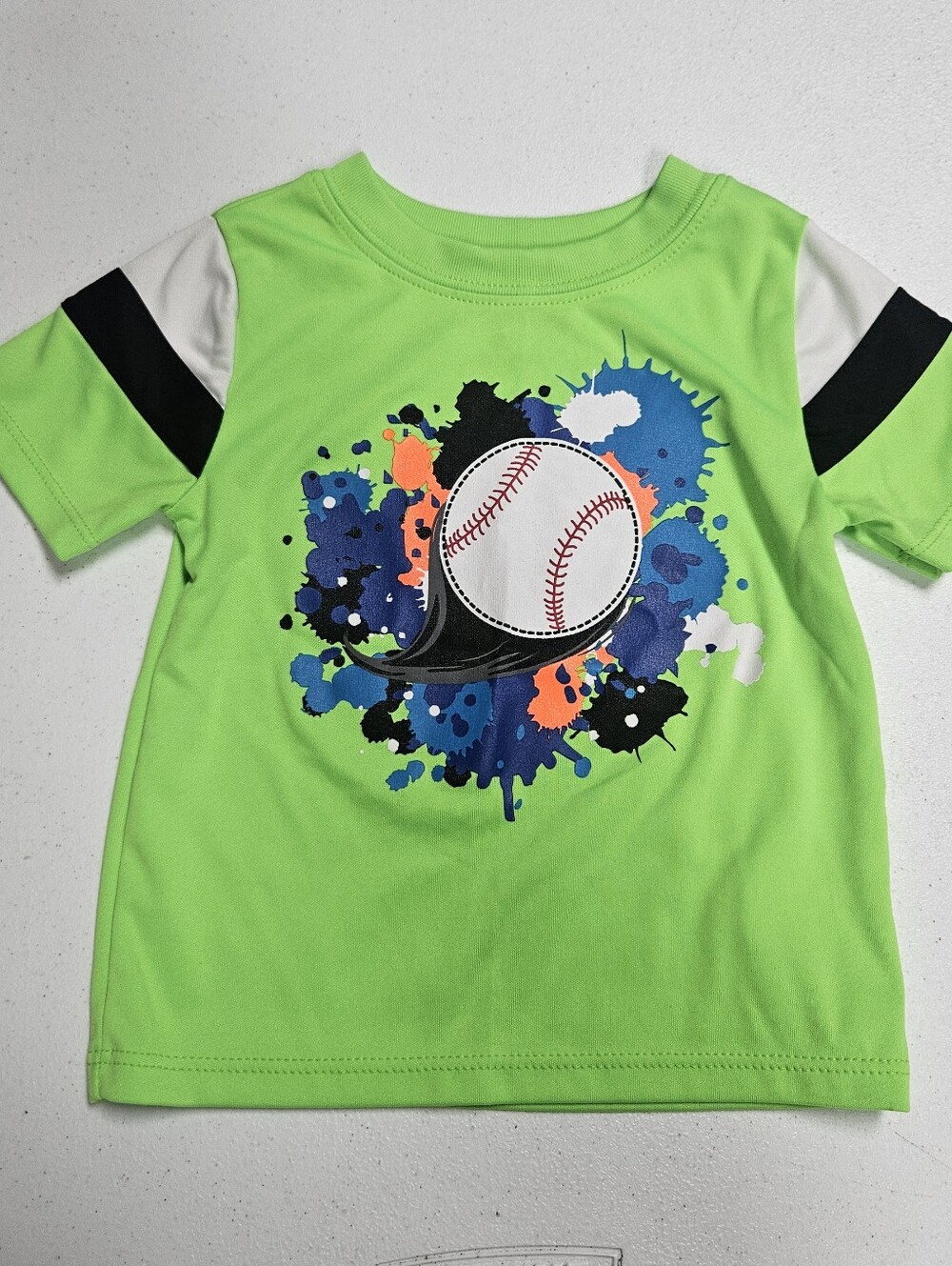 Baseball Baby Tee with baseball graphic
